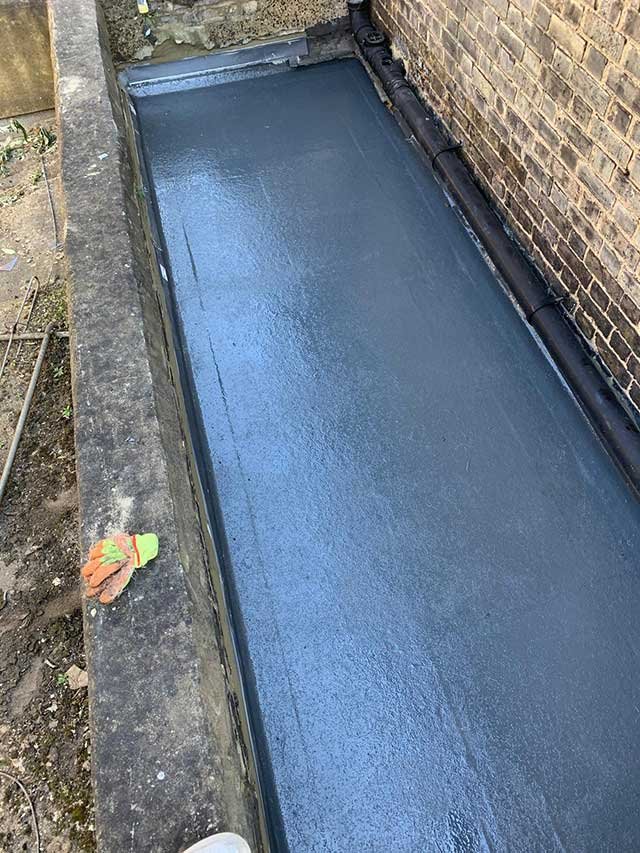 A new fibreglass roof being installed