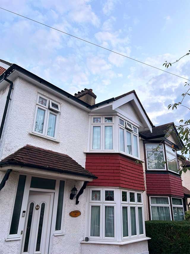 A house with a pitched roof that underwent repair